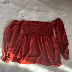 Orange blouse worn twice